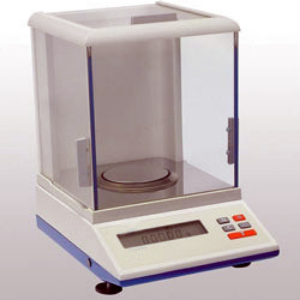 Electronic analytical balance with a glass draft shield and digital display